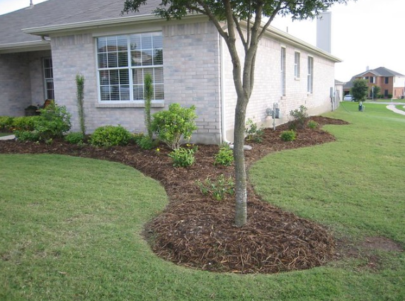 The photo shows the finished turf installation work in Huntington